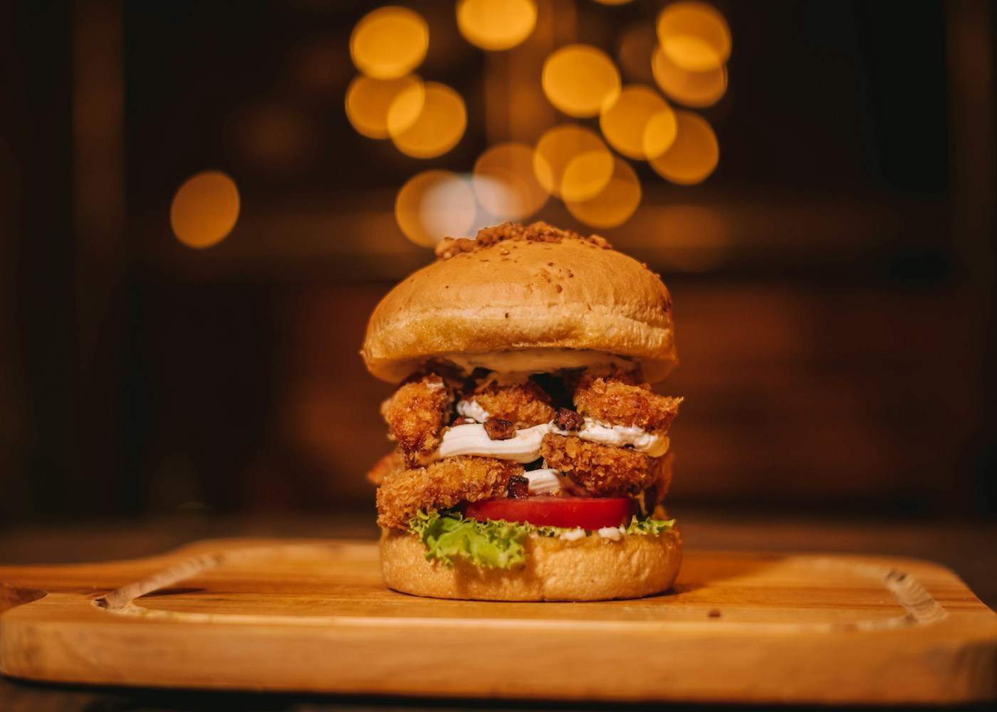 Fried chicken burger with greens and sauce